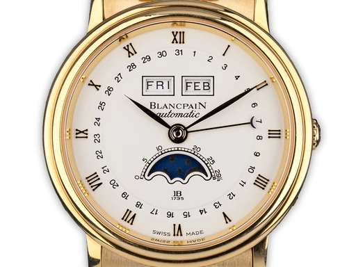 Title: Villeret Complete Calendar
Brand: Blancpain
Model: Villeret Complete Calendar
Ref: 6595-1418-31
Category: Dress
Diameter: 34mm
Functions: Dato, Ugedag, Månefase
Year: 1980
Price: 125000
Condition: undefined
Dial Color: Hvid
Strap: Andet
Case material: Guld
Gender: Herre
Match: 100.0%
Billedet er ejet af Ole Mathiesen (121157) Et Blancpain ur