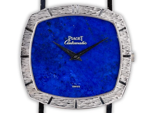 Title: Vintage Cushion Automatic 'Lapis Lazilu'
Brand: Piaget
Model: Vintage Cushion Automatic 'Lapis Lazilu'
Ref: 13401
Category: Dress
Diameter: 31mm
Functions: Dato
Year: 1970
Price: 65000
Condition: undefined
Dial Color: Blå
Strap: Læder
Case material: Guld
Gender: Unisex
Match: 100.0%
Billedet er ejet af Ole Mathiesen (101839) Et Piaget ur