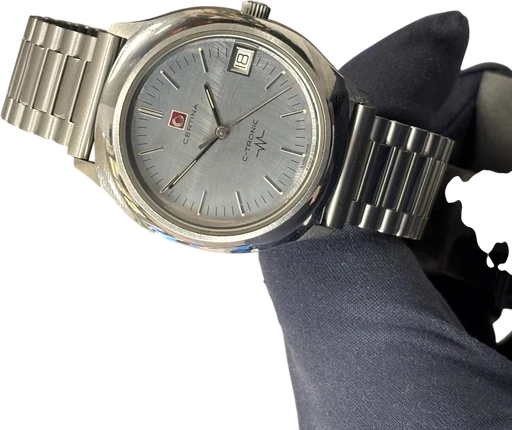 Title: Vintage C-Tronic – Elektronisk Swiss Made ur (1970’erne)
Brand: Certina
Model: C-Tronic
Ref: null
Category: Dress
Diameter: 37mm
Functions: Dato
Year: 1972
Price: 3200
Condition: 8.5
Dial Color: Sølv
Strap: Metal
Case material: Stål
Gender: Herre
Match: 100.0%
Billedet er ejet af Studts Vintage (614545) Et Certina ur
