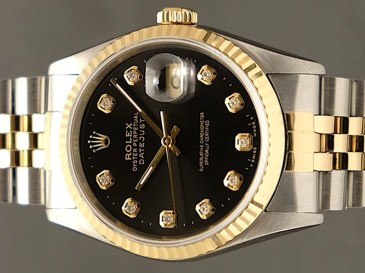 Title: Datejust 36 mm
Brand: Rolex
Model: Datejust 36 mm
Ref: 16233
Category: Dress
Diameter: 36mm
Functions: Dato
Year: 1995
Price: 55995
Condition: 9.0
Dial Color: Sort
Strap: Metal
Case material: Guld
Gender: Unisex
Match: 100.0%
Billedet er ejet af TimeToWatch (318851) Et Rolex ur