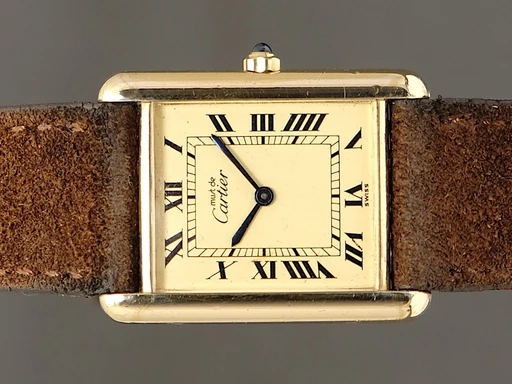 Title: Tank Vermeil
Brand: Cartier
Model: Tank Vermeil
Ref: 81006
Category: Dress
Diameter: 30mm
Functions: 
Year: 1990
Price: 14995
Condition: undefined
Dial Color: Gul
Strap: Læder
Case material: Guld
Gender: Unisex
Match: 100.0%
Billedet er ejet af TimeToWatch (144071) Et Cartier ur