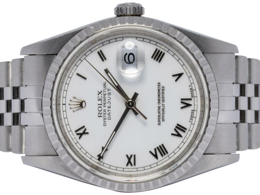 Title: Datejust 36, Hvid, Romersk, Jubilee
Brand: Rolex
Model: Datejust 36
Ref: 16220
Category: Dress
Diameter: 36mm
Functions: Dato
Year: null
Price: 59900
Condition: undefined
Dial Color: Hvid
Strap: Metal
Case material: Stål
Gender: Herre
Match: 100.0%
Billedet er ejet af Urhandleren (102588) Et Rolex ur