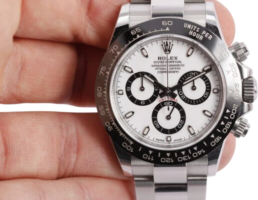 Title: Daytona (Panda) (New)
Brand: Rolex
Model: Daytona
Ref: 116500LN
Category: Racing
Diameter: 40mm
Functions: Kronograf, Dato
Year: 2021
Price: 195000
Condition: 8.5
Dial Color: Hvid
Strap: Metal
Case material: Stål
Gender: Herre
Match: 100.0%
Billedet er ejet af Wine & Watches (935705) Et Rolex ur