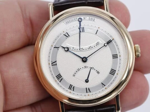 Title: Classique Retrograde Seconds (New)
Brand: Breguet
Model: Classique
Ref: 5207BA/12/9V6
Category: Dress
Diameter: 39mm
Functions: Dato
Year: 2006
Price: 85000
Condition: undefined
Dial Color: Sølv
Strap: Læder
Case material: Guld
Gender: Herre
Match: 100.0%
Billedet er ejet af Wine & Watches (329366) Et Breguet ur